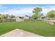 The backyard has a grassy lawn with a shed at 6320 River Valley Way, Indianapolis, IN 46221