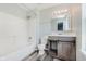 Bathroom includes a vanity sink and shower-tub combo with modern fixtures at 6320 River Valley Way, Indianapolis, IN 46221