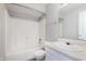 This bathroom has a tub, toilet, vanity and mirror at 6320 River Valley Way, Indianapolis, IN 46221