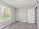 This bedroom has neutral walls, carpeted floors and a window at 6320 River Valley Way, Indianapolis, IN 46221