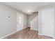 Inviting foyer with hardwood floors, a decorative front door, and easy access to the upper level at 6320 River Valley Way, Indianapolis, IN 46221