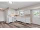 Cozy kitchen featuring white cabinets and modern appliances at 6320 River Valley Way, Indianapolis, IN 46221