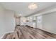 Bright kitchen with white cabinets, hardwood floors, and modern appliances, ready for culinary adventures at 6320 River Valley Way, Indianapolis, IN 46221