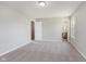 Large main bedroom with carpet and a view of the ensuite bath at 6320 River Valley Way, Indianapolis, IN 46221