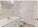 Clean bathroom with a white vanity, modern fixtures, and a shower-tub combo at 6332 Long River Ln, Indianapolis, IN 46221