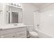 A clean, well-lit bathroom featuring a shower and single sink at 6332 Long River Ln, Indianapolis, IN 46221