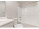 Bright bathroom featuring a shower-tub combination and clean white fixtures, offering a refreshing space at 6332 Long River Ln, Indianapolis, IN 46221