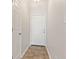 Bright entryway features neutral tones, tile floors, and a white front door at 6332 Long River Ln, Indianapolis, IN 46221