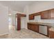 View of a kitchen featuring granite countertops, stainless steel appliances, and tiled floors at 6332 Long River Ln, Indianapolis, IN 46221