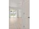 Open-concept living room with sliding glass doors, and hard wood floors at 6332 Long River Ln, Indianapolis, IN 46221