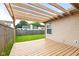 Outdoor patio with a wooden pergola, a serene space for relaxation and outdoor enjoyment at 6332 Long River Ln, Indianapolis, IN 46221