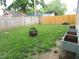 Manicured backyard with fire pit and garden boxes at 6344 Turner Dr, Clayton, IN 46118