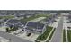 Wide aerial view of a well-planned community showcasing attractive homes, a pond, and pristine landscaping at 640 Axford Bay Dr, Westfield, IN 46074