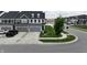 Charming townhome with a two-car garage, manicured lawn, and inviting curb appeal at 640 Axford Bay Dr, Westfield, IN 46074