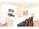 Bright kitchen features an island with seating, stainless steel appliances, and white cabinets at 640 Axford Bay Dr, Westfield, IN 46074