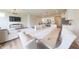 Open floor plan with a spacious living room, dining area, and a cozy sectional sofa at 640 Axford Bay Dr, Westfield, IN 46074