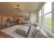 Open floor plan with a spacious living room, dining area, and a cozy sectional sofa at 640 Axford Bay Dr, Westfield, IN 46074