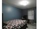 Bedroom with large bed, window and patterned curtains at 6714 Colleens Way, Indianapolis, IN 46221