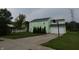 Inviting two-story home features a basketball hoop and a well-maintained front yard at 6714 Colleens Way, Indianapolis, IN 46221