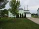 Charming two-story home with a well-manicured lawn and a tree-lined front yard at 6714 Colleens Way, Indianapolis, IN 46221