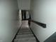 Staircase leading to an entrance door and a hardwood floor landing at 6714 Colleens Way, Indianapolis, IN 46221