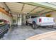 Spacious two-car garage featuring overhead lighting, a shelving unit, and space for working on projects at 6842 Sextant Dr, Indianapolis, IN 46260