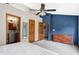 Bright bedroom featuring an attached bathroom and ample closet space at 6842 Sextant Dr, Indianapolis, IN 46260