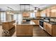 Bright kitchen with center island, stainless steel appliances, and plenty of cabinet space at 7211 Topp Creek Ct, Indianapolis, IN 46214