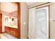 Bathroom featuring a walk-in shower and wood cabinets at 7220 Normandy Way, Indianapolis, IN 46278