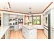 Spacious kitchen with granite counters, ample cabinetry, and modern appliances at 7220 Normandy Way, Indianapolis, IN 46278