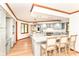 Bright kitchen featuring granite countertops, stainless appliances, and island seating at 7220 Normandy Way, Indianapolis, IN 46278