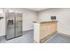 Basement with a stainless steel refrigerator and an unfinished bar with a chalkboard at 749 Bracknell Dr, Avon, IN 46123