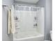 This bathroom features a shower and tub combo with shower shelves and towel rack at 749 Bracknell Dr, Avon, IN 46123