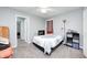 This neutral bedroom features a ceiling fan, closet and doorway leading to an adjacent room at 749 Bracknell Dr, Avon, IN 46123