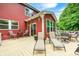 Spacious deck featuring lounge chairs and outdoor dining furniture surrounded by trees at 749 Bracknell Dr, Avon, IN 46123