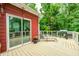 Deck with outdoor furniture and a grill overlooking the lush green trees at 749 Bracknell Dr, Avon, IN 46123
