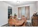 Comfortable dining room features a wood table and chairs at 749 Bracknell Dr, Avon, IN 46123