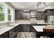 Bright kitchen features recessed lighting, ample counter space, and stainless appliances at 749 Bracknell Dr, Avon, IN 46123