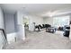 Upstairs living area with carpet, ceiling fan and natural light at 749 Bracknell Dr, Avon, IN 46123