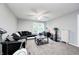 Cozy living room with comfortable seating, a ceiling fan, and plenty of natural light at 749 Bracknell Dr, Avon, IN 46123