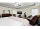 Spacious main bedroom with a tray ceiling, a ceiling fan, and natural light at 749 Bracknell Dr, Avon, IN 46123