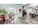 Cozy sunroom with large windows and a sliding door leading to the deck at 749 Bracknell Dr, Avon, IN 46123