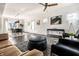 Spacious living room and dining area featuring an open layout, modern decor, and abundant natural light at 805 N Temple Ave, Indianapolis, IN 46201