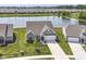 Bird's eye view showcases the home's location near a pond and other houses at 8263 Bryce Blvd, Pendleton, IN 46064