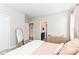 Charming bedroom with soft pink accents, dresser and ensuite bathroom access at 8263 Bryce Blvd, Pendleton, IN 46064