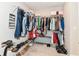 Walk-in closet featuring ample hanging space, shoe racks, and storage for clothing and accessories at 8263 Bryce Blvd, Pendleton, IN 46064