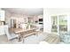 Open concept: dining with a rustic table set, connecting kitchen, living space, and patio access at 8263 Bryce Blvd, Pendleton, IN 46064