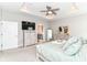 Bright main bedroom features tray ceilings, a ceiling fan, and a coordinating furniture set at 8263 Bryce Blvd, Pendleton, IN 46064