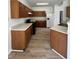 Functional kitchen with wood cabinets, a full appliance suite, and generous counter space for meal prep at 832 Spinney Ln, Whiteland, IN 46184