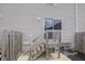 Backyard access from sliding glass door with stairs to lower patio at 8410 Hague Rd # 5, Indianapolis, IN 46256